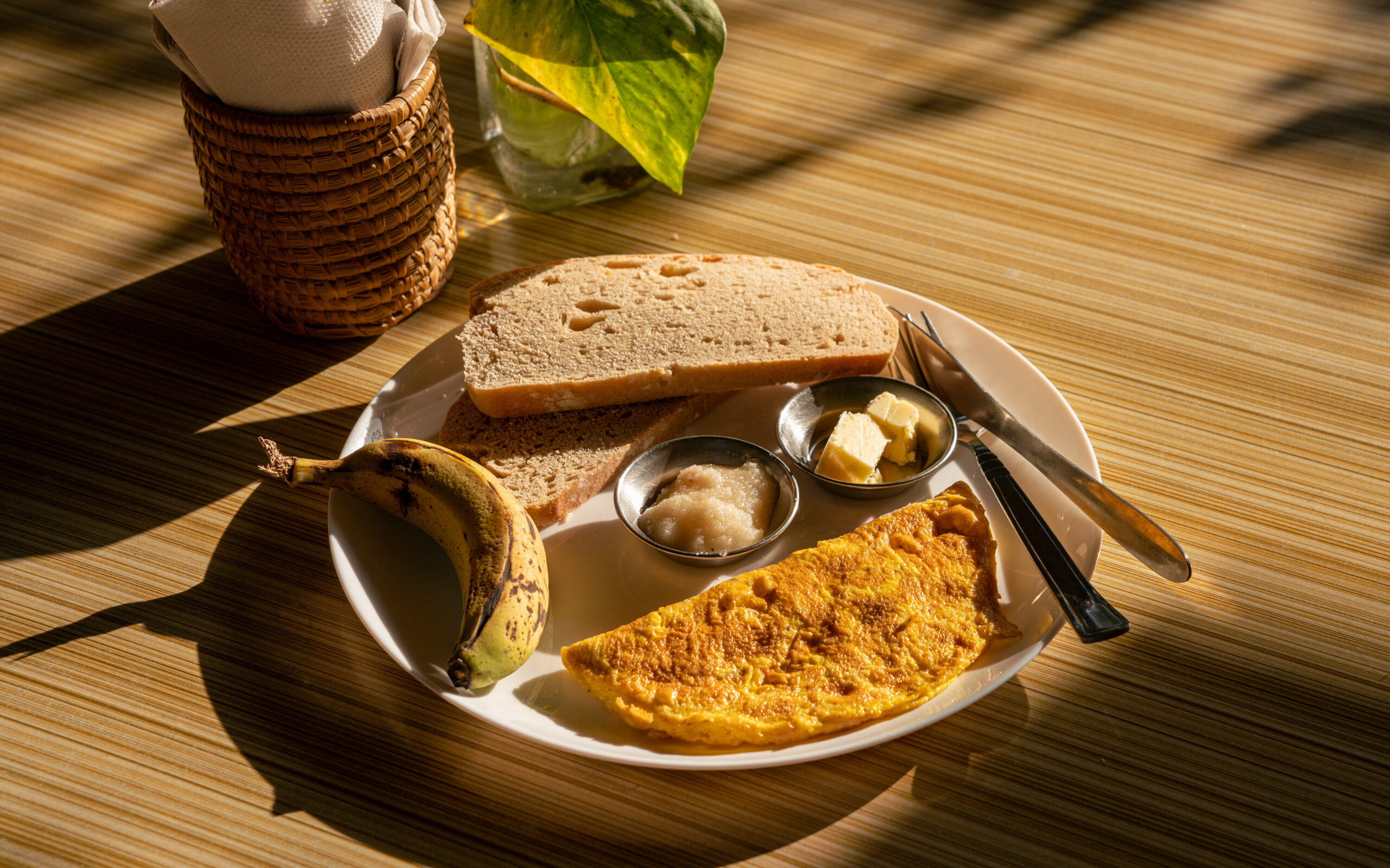 Breakfast set : Homemade bread, eggs, honey and banana